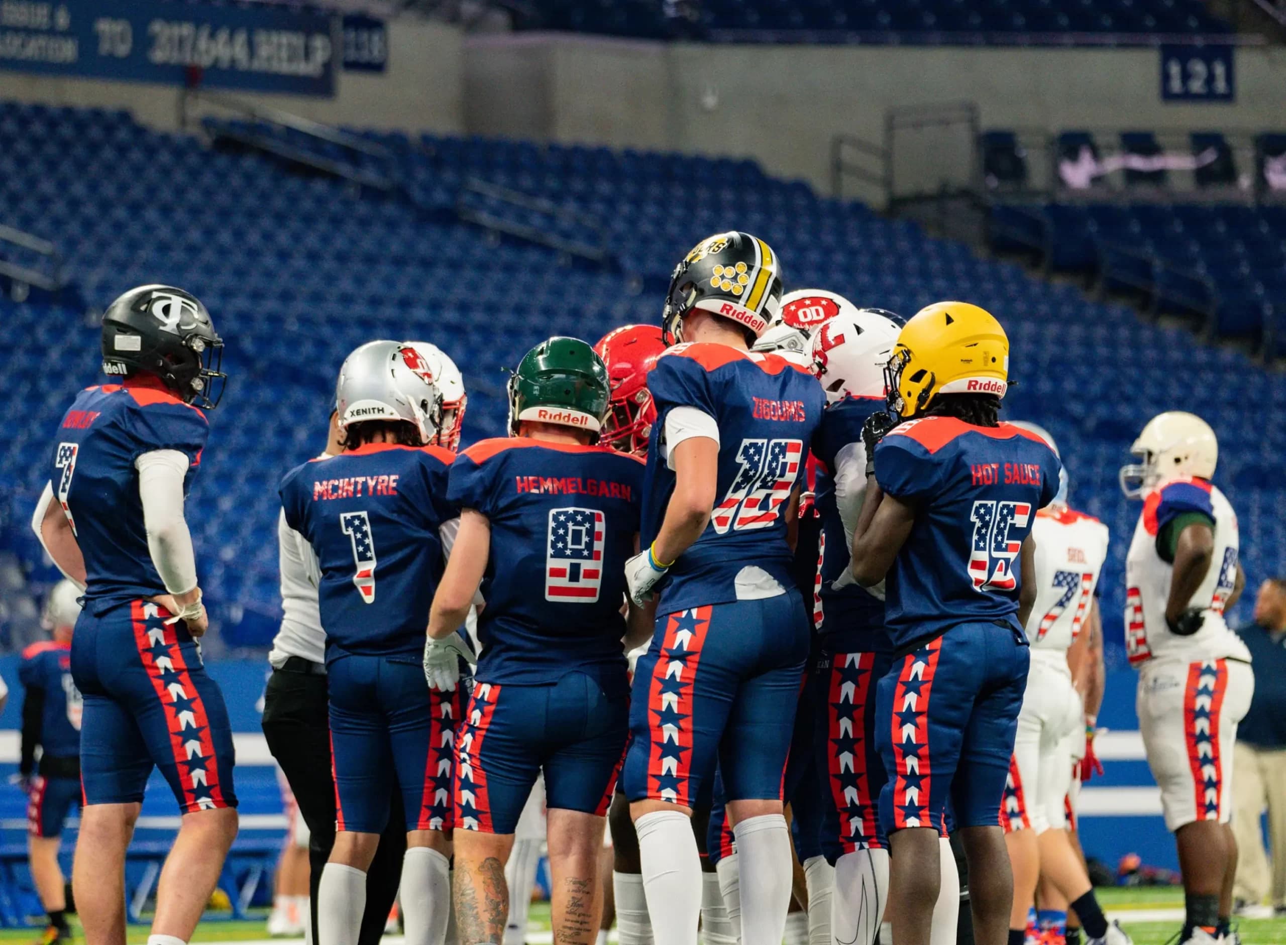 Players huddled at the O-D All-American Bowl